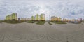 360 hdri panorama view with skyscrapers in new modern residential complex with high-rise buildings in town with overcast sky in