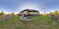 360 hdri panorama view in yard near wooden house in village with mobile communication tower in equirectangular spherical Royalty Free Stock Photo