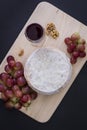 Head of cheese on wood Royalty Free Stock Photo