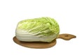 Head Chinese salad Peking, pe-tsai cabbage on a wooden kitchen cutting board