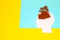 head with coffee powder scattered above her on a blue-yellow background, coffee time, vocations