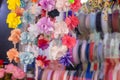 Head crown. Store front hanging on metal shelves. There are fake textile flowers on the crown. Royalty Free Stock Photo