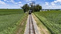 Head on Drone View of a Steam Passenger Train Approaching on a single Track Royalty Free Stock Photo