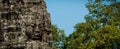 Head encarved in stone Bayon temple angkor Royalty Free Stock Photo