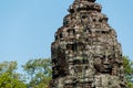 Head encarved in stone Bayon temple angkor Royalty Free Stock Photo