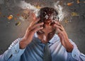 Head explosion of a stressed and tired businessman due to overwork. Royalty Free Stock Photo