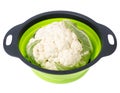 Head of fresh cauliflower in colander on white background Royalty Free Stock Photo