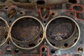 Car engine lower part , after head gasket failure, oil spilled Royalty Free Stock Photo