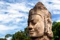 Head of gate guardian statue at the entrance of Angkor Thom Camb