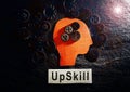 Head and gears with Upskill text