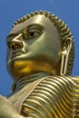 The head of the giant 30 metre high golden statue of Buddha at the Golden Temple in Dambulla in Sri Lanka.