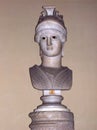 The head of the goddess in the helmet, white black marble.