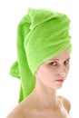 Head in green towel