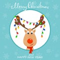 Head of reindeer with Christmas lights on blue background Royalty Free Stock Photo