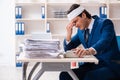 Head injured male employee working in the office Royalty Free Stock Photo