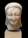 Head of Kouros from the Sacred Way in the Heraion, Samos island, Greece. It is an ancient Archaic Greek sculpture