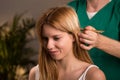 Head massage with bamboo sticks Royalty Free Stock Photo