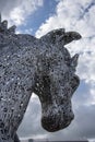 The head of a metal horse made from letters of the English alphabet