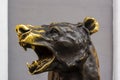 Head of a metal statue of evil Russian bear with predatory grinned jaws Royalty Free Stock Photo