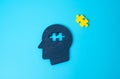 Head and missing puzzle, concept. What is missing for happiness and peace of mind Royalty Free Stock Photo