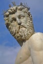 The head of Neptune against a blue sky Royalty Free Stock Photo