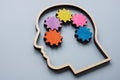 Head outline and colored gears as a concept for lateral thinking, creativity and neurodiversity. Royalty Free Stock Photo