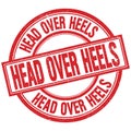 HEAD OVER HEELS written word on red stamp sign