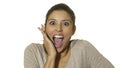 Head portrait of young happy and excited hispanic woman 30s in surprise and astonished face expression eyes and mouth wide open is Royalty Free Stock Photo