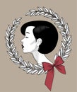 Head in profile of a beautiful young woman with black hair in laurel wreath with a red bow Royalty Free Stock Photo