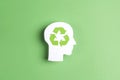 Head profile silhouette with recycle symbol on green background Royalty Free Stock Photo