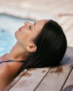 Head, relax and pool with a black woman resting in the water during summer vacation or holiday alone. Luxury, swimming Royalty Free Stock Photo