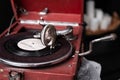 Head with an retro old vintage style gramophone needle on the vinyl disc closeup Royalty Free Stock Photo