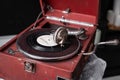 Head with an retro old vintage style gramophone needle on the vinyl disc closeup Royalty Free Stock Photo