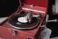 Head with an retro old vintage style gramophone needle on the vinyl disc closeup Royalty Free Stock Photo