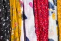 Head scarf market background, multicolored and colorful cloth, hanging