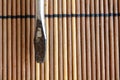 Head of Screwdriver flat mouth on wooden background, Flat-blade screwdriver