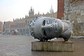 Head sculpture Eros Bendato on Market Square, Krakow, Poland Royalty Free Stock Photo