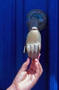 Head shaped blue door knob