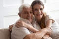 Head shot close up portrait happy two generations family cuddling. Royalty Free Stock Photo