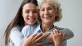 Portrait of positive happy multigenerational female bonding family. Royalty Free Stock Photo