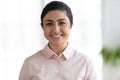 Head shot close up portrait of young indian businesswoman. Royalty Free Stock Photo