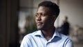 Head shot close up young thoughtful african american businessman. Royalty Free Stock Photo