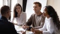 Head shot interested mixed race employees involved in educational workshop. Royalty Free Stock Photo