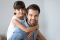 Head shot portrait daughter and father indoors Royalty Free Stock Photo