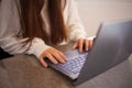 Head shot pleasant happy young woman freelancer working on computer at home. Attractive businesswoman studying online, using Royalty Free Stock Photo