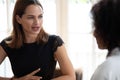 Focused hr manager holding job interview with african american applicant. Royalty Free Stock Photo