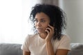 Headshot portrait african 30s woman talking on phone Royalty Free Stock Photo