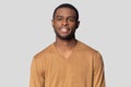 Head shot portrait confident African American man with healthy smile