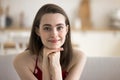 Head shot portrait of cute young woman staring at camera Royalty Free Stock Photo