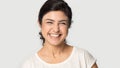 Head shot portrait excited Indian girl laughing close up